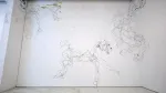 Wire sculpture of galloping horses suspended across a white gallery wall in an SVA MFA exhibition.
