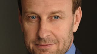 Cropped portrait of Yves Bouvier in Paris in 2008