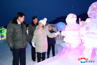 People stand near ice sculptures in North Korea