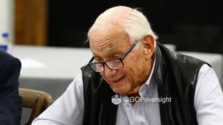 Les Wexner is pictured smiling in a screenshot from his deposition to the House Oversight Committee. 