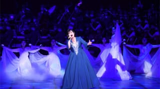 A woman performs onstage in North Korea